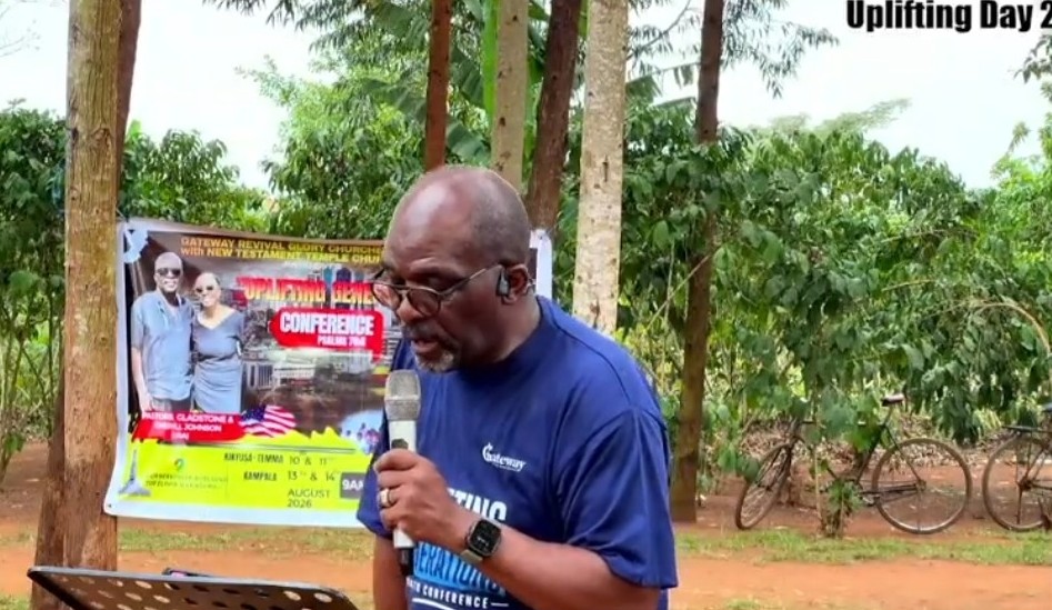Pastor Gladstone Johnson preaching outdoors in Tema