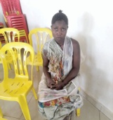 Sumayah seated in church when she first arrived during a service